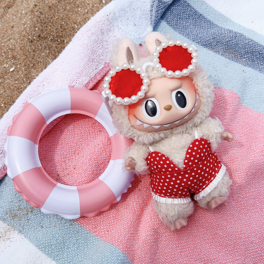 Labubu in red swimsuit outfit