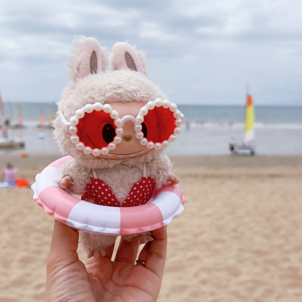 Labubu in red swimsuit outfit